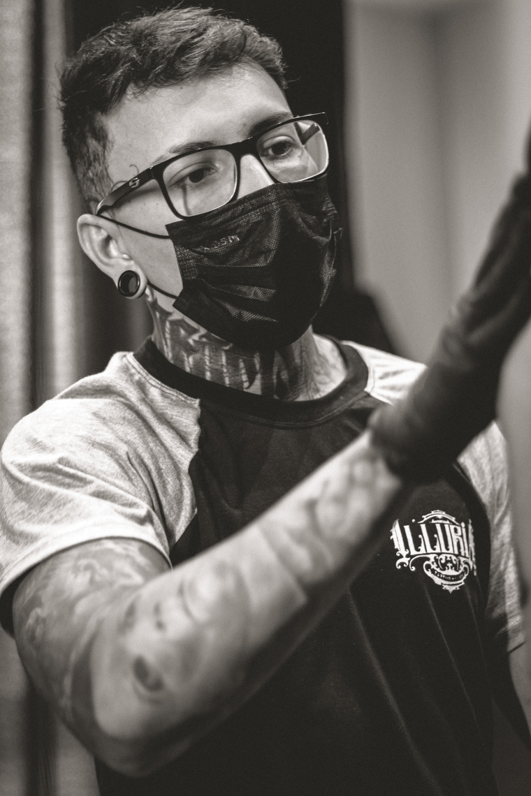 Igor Moreira tattooing in the studio